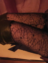 Slutty mature witch Caro looks super sexy in her black boots and pantyhose
